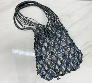 DIOR OBLIQUE TECHNICAL WOVEN NET BUCKET BAG