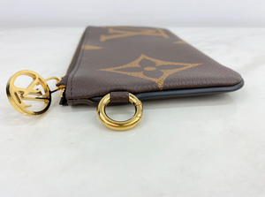 LOUIS VUITTON GIANT REVERSE MINI MONOGRAM TRIO POUCH