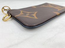 LOUIS VUITTON GIANT REVERSE MINI MONOGRAM TRIO POUCH