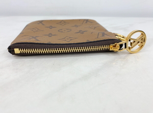 LOUIS VUITTON GIANT REVERSE MINI MONOGRAM TRIO POUCH