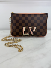 LOUIS VUITTON DOUBLE ZIP POCHETTE DE
