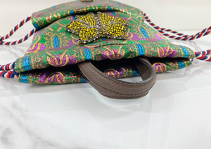 GUCCI BROCADE ANIMALIER BOW DRAWSTRING BACKPACK LIMITED EDITION