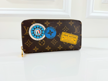 LOUIS VUITTON WALLET ZIPPY "WORLD TOUR" LIMITED EDITION