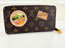 LOUIS VUITTON WALLET ZIPPY "WORLD TOUR" LIMITED EDITION