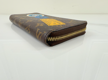 LOUIS VUITTON WALLET ZIPPY "WORLD TOUR" LIMITED EDITION