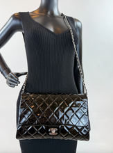 CHANEL PATENT QUILTED CLUTCH WITH CHAIN FLAP