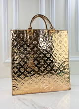 LOUIS VUITTON MIRROR SAC PLAT IN GOLD COLLECTORS ITEM