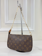 LOUIS VUITTON POCHETTE ACCESSOIRES