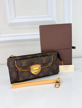 LOUIS VUITTON WALLET ASTRID / WRISTLET