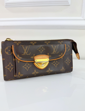 LOUIS VUITTON WALLET ASTRID / WRISTLET