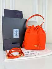 PRADA TESSUTO NYLON BUCKET CROSSBODY IN ORANGE