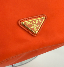 PRADA TESSUTO NYLON BUCKET CROSSBODY IN ORANGE
