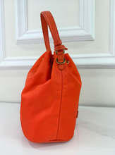 PRADA TESSUTO NYLON BUCKET CROSSBODY IN ORANGE