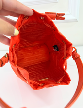 PRADA TESSUTO NYLON BUCKET CROSSBODY IN ORANGE