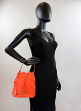 PRADA TESSUTO NYLON BUCKET CROSSBODY IN ORANGE