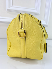 LOUIS VUITTON SPEEDY 25 BANDOULIERE EMPREINTE YELLOW