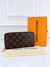 LOUIS VUITTON WALLET ZIPPY IN ROSE PINK