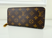 LOUIS VUITTON WALLET ZIPPY IN ROSE PINK