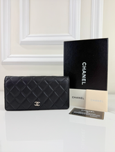 CHANEL QUILTED YEN FLAP  WALLET