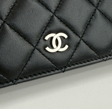CHANEL QUILTED YEN FLAP  WALLET