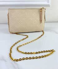 LOUIS VUITTON DOUBLE ZIP POCHETTE EMPREINTE BEIGE AND ROSE