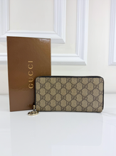 GUCCI ZIP AROUND WALLET