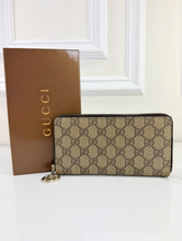 GUCCI ZIP AROUND WALLET