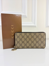 GUCCI ZIP AROUND WALLET