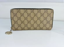 GUCCI ZIP AROUND WALLET