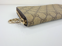 GUCCI ZIP AROUND WALLET