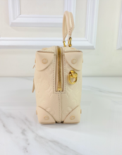 LOUIS VUITTON PETITE MALLE SOUPLE EMPREINTE IN CREME