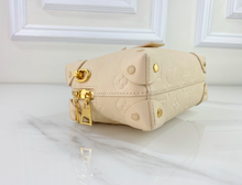 LOUIS VUITTON PETITE MALLE SOUPLE EMPREINTE IN CREME