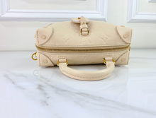 LOUIS VUITTON PETITE MALLE SOUPLE EMPREINTE IN CREME