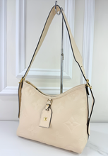 LOUIS VUITTON CARRY ALL PM EMPREINTE CREAM