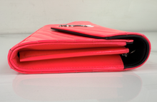 YSL MATELASSE FLAP ENVELOPE CROSSBODY IN NEON PINK