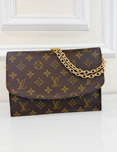 LOUIS VUITTON POCHETTE RABAT 23 ON CHAIN