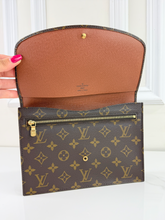 LOUIS VUITTON POCHETTE RABAT 23 ON CHAIN