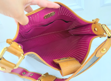 LOUIS VUITTON PERFORATED MUSETTE