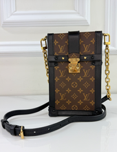 LOUIS VUITTON TRUNK VERTICLE POCHETTE