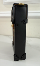 LOUIS VUITTON TRUNK VERTICLE POCHETTE