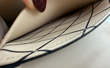 LOUIS VUITTON TRUNK VERTICLE POCHETTE