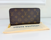 LOUIS VUITTON WALLET ZIPPY MONOGRAM FUCHSIA