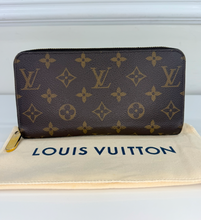 LOUIS VUITTON WALLET ZIPPY MONOGRAM FUCHSIA