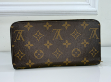 LOUIS VUITTON WALLET ZIPPY MONOGRAM FUCHSIA