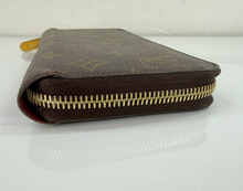 LOUIS VUITTON WALLET ZIPPY MONOGRAM FUCHSIA