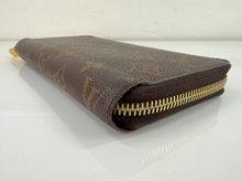 LOUIS VUITTON WALLET ZIPPY MONOGRAM FUCHSIA